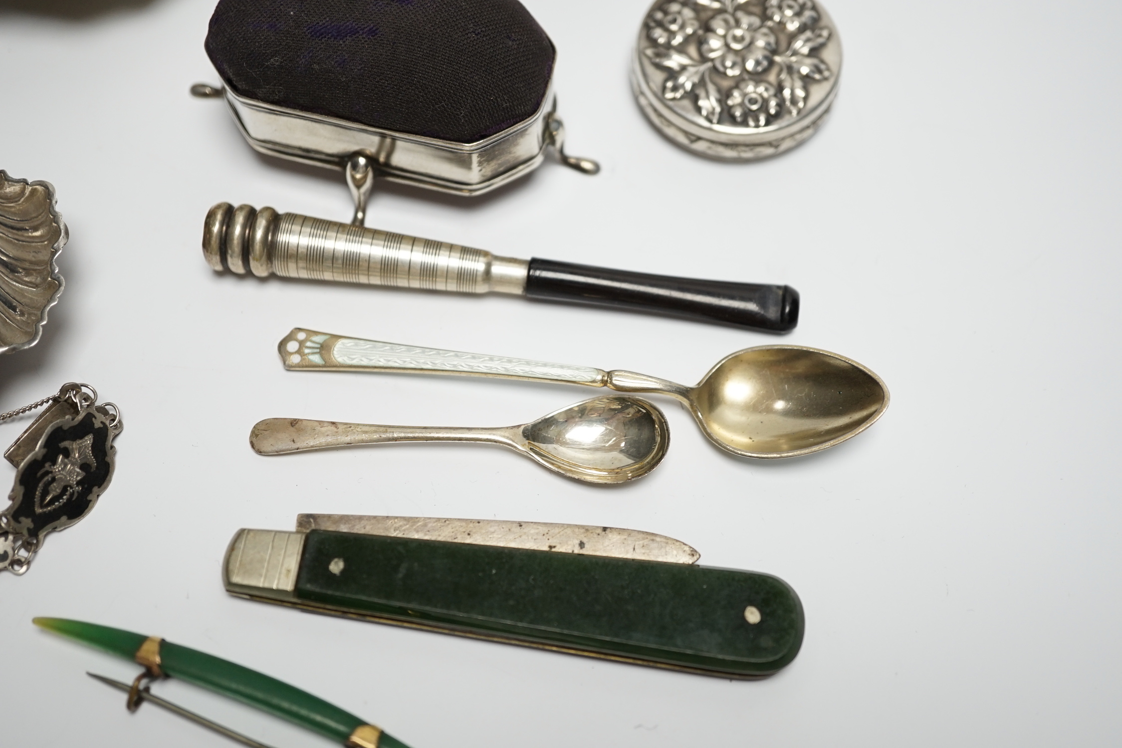 A late Victorian silver bun salt and other items including silver mounted pin cushion, silver shell salt, spoons etc.